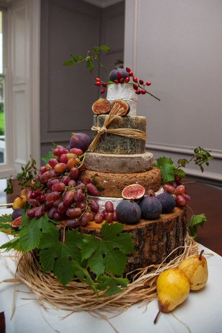 Bride Wears Simple Wedding Dress To Romantic Seaside Nuptials In Ireland cheese-wedding-cake