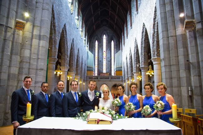 Bride Wears Simple Wedding Dress To Romantic Seaside Nuptials In Ireland church-wedding-blue-bridesmaids
