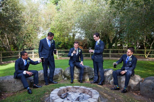 Bride Wears Simple Wedding Dress To Romantic Seaside Nuptials In Ireland wedding-beer-guinees-groomsmen-drinking